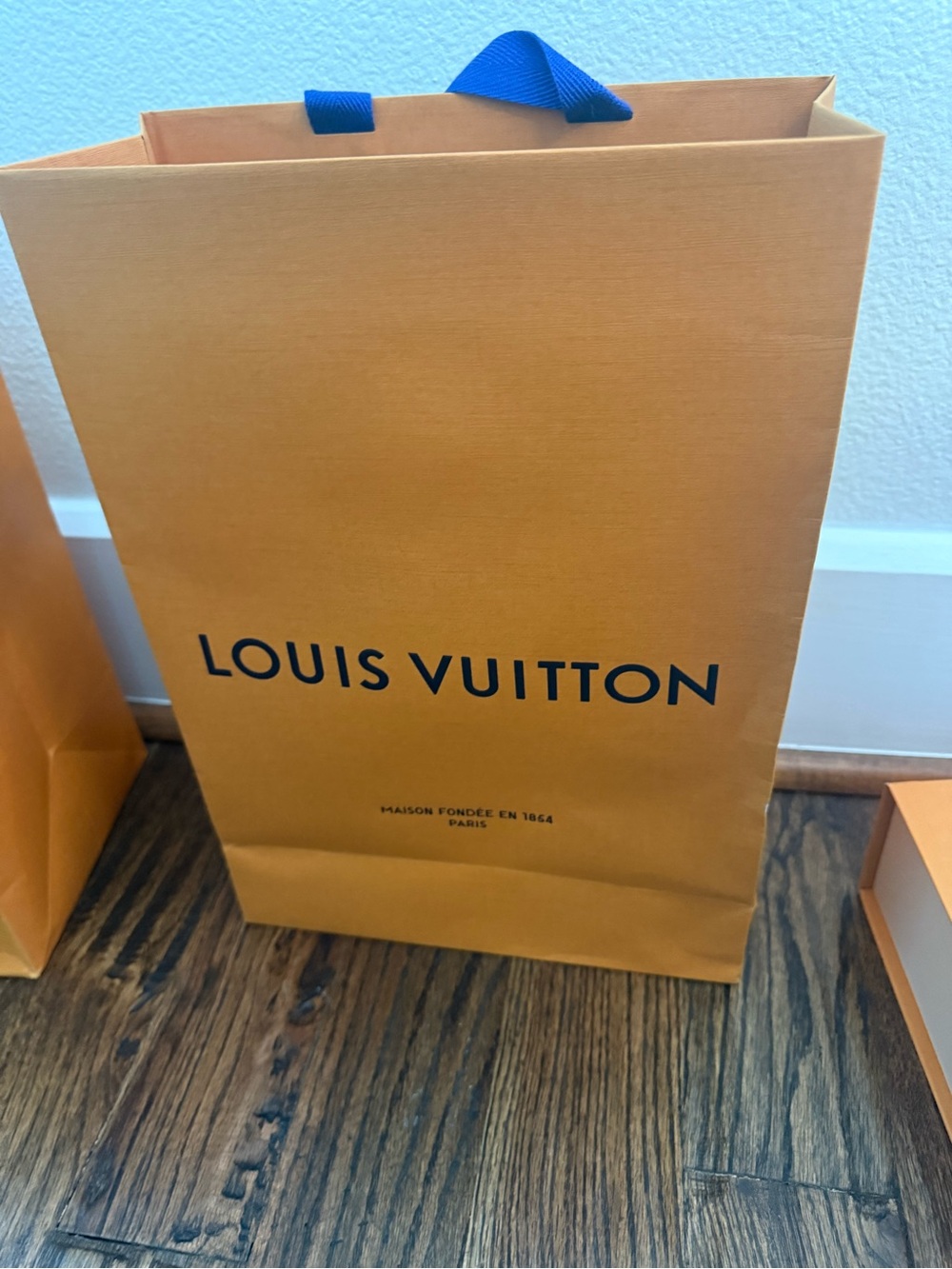 Louis Vuitton Orange Shopping Bag with Blue Handles